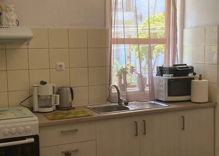 Δωμάτια σε οικογενειακή κατοικία Georgia's House Λεωνίδιο